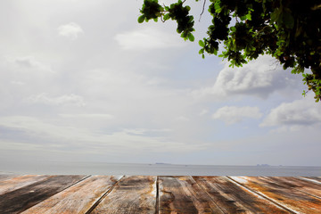 Empty table on on a tropical beach blur.