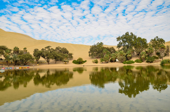 Oasis- Huacachina, a village in southwestern Peru, built around a small oasis surrounded by sand dunes, Ica Region, Peru