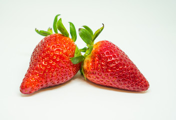 2 strawberries in white background, isolated