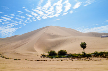 Oasis- Huacachina, a village in southwestern Peru, built around a small oasis surrounded by sand dunes, Ica Region, Peru