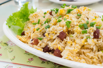 Close up fried rice with pork thai food style on white dish