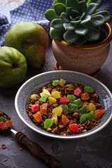 Granola with candied fruit, pears and succulent