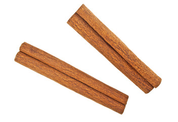 Two cinnamon sticks isolated on white background