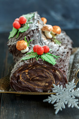 Homemade traditional Christmas log cake.