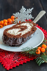 Sliced homemade Christmas chocolate yule log.