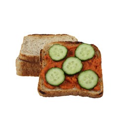 Vegetarian breakfast - toast with cucumber with stack of toasted bread behind isolated on white background