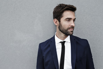 Businessman against gray background