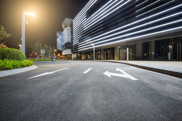 Fototapeta premium empty asphalt road nearby office building,china.