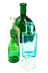 Old glass bottles on a white background