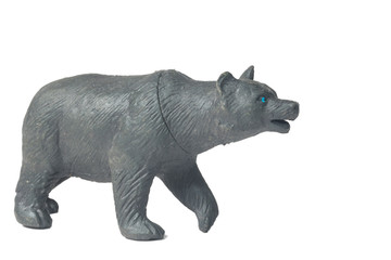 rubber(plastic) toy of black bear isolated white
