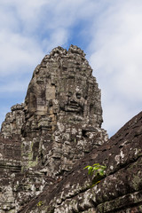 Towers with faces in Angkor Wat, temple complex in Cambodia and the largest religious monument in the world. UNESCO World Heritage Site.