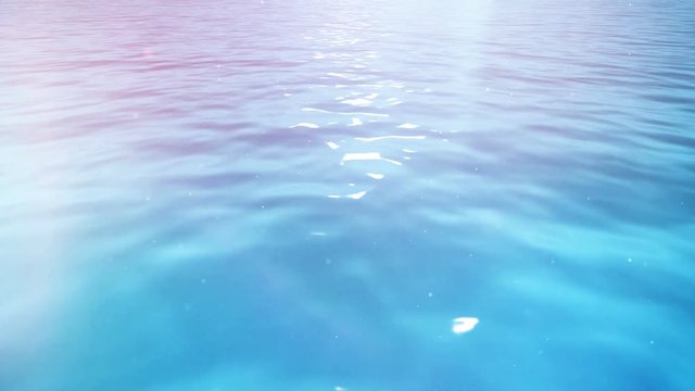 A stylized dreamlike water loop with color washes and floating dust.