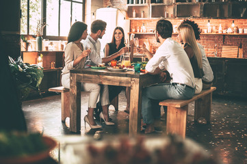 Enjoying dinner with friends. 