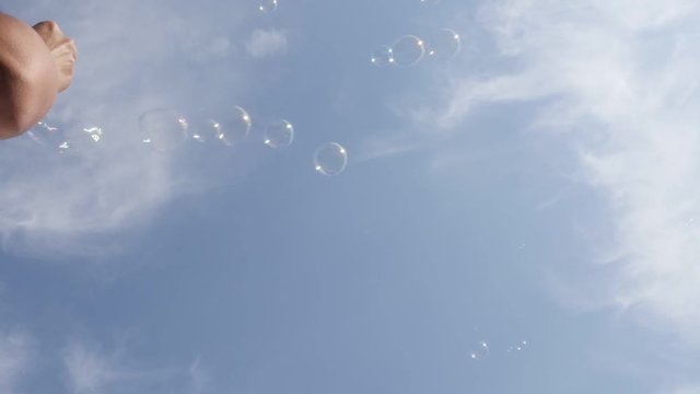 Cloudy blue sky and air soap bubbles flying in slow motion relaxing 1920X1080 FullHD footage - Soap water transparent balls floating high slow-mo 1080p HD video 