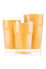 mango, peach, and banana smoothie in three size of glass