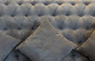 Closeup Pillows over the sofa, mockup and decorate concept