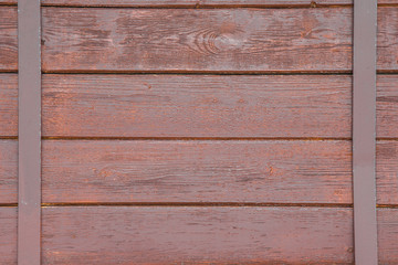 Wooden horizontal lines. Iron vertical lines on both sides. Wall background.