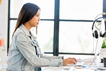 Young woman in office