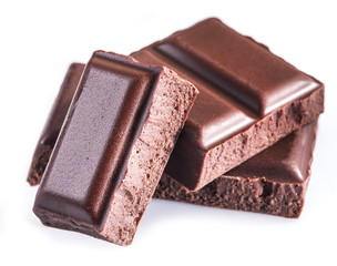 Pieces of chocolate bar isolated on a white background.