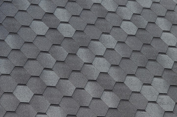 Close up view on Asphalt Roofing Shingles Background. Roof Shingles - Roofing.