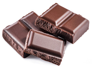 Pieces of chocolate bar isolated on a white background.