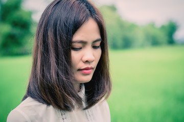 Lifestyle portrait of pretty young hipster woman making photo. Retro photographer.