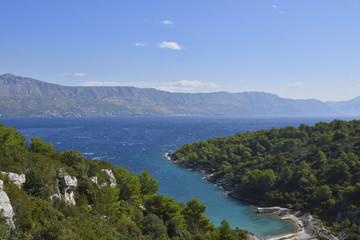 Nice beach with blue water and a blue sky, picture from Island Brac in Croatia.