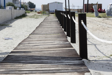 Obraz premium The walkway on the white beach