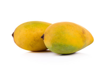 Delicious ripe mango with  on white background.