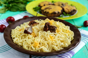 Italian Pasta (spaghetti) with dried porcini mushrooms and Parmesan. Serve with baked stuffed champignons