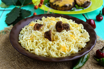 Italian Pasta (spaghetti) with dried porcini mushrooms and Parmesan. Serve with baked stuffed champignons