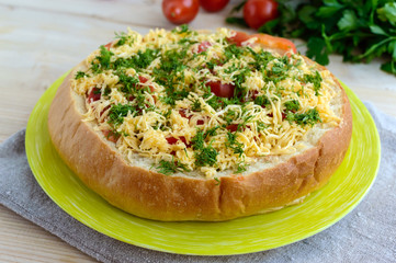 Original appetizer - stuffed wheat bread is baked. Dish in a rustic style.