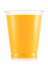 Orange juice in plastic cup - obrazy, fototapety, plakaty