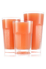 Grapefruit juice in three size of glass - obrazy, fototapety, plakaty