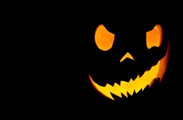 Terrible fiery face of the pumpkin