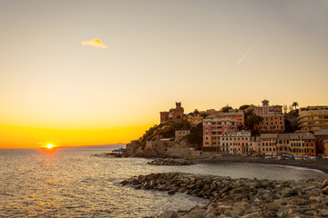 Sunset in the sea village with color huoses/ sunset/ Sun/houses/Genoa/Italy