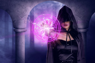 Asian witch woman show magic pentagram in his hand
