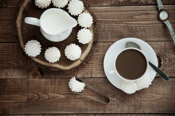 mug of coffee and meringue
