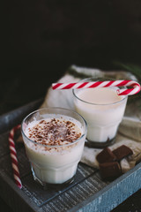 cocoa with chocolate on dark background