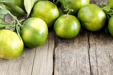 Tangerine on wooden background 