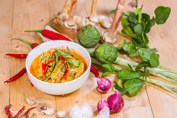 Thailand Food Curry pork spicy on wood table. Thailand call Panang.