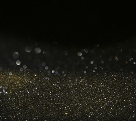 glitter vintage lights background. de focused