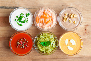 Assorted sauces on wood