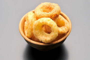 onion ring on background, junk food, fast food, unhealthy and fattening