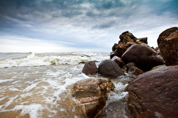 Cape Kolka on the Baltic Sea, near the entry to Gulf of Riga. Dramatic sky and storm in the sea