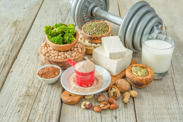 Selection vegan protein sources on wood background