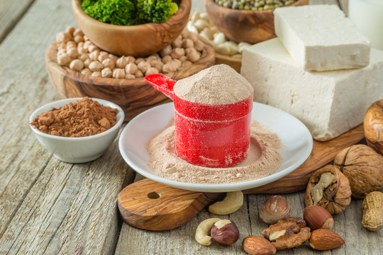 Selection vegan protein sources on wood background