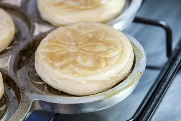 cooking Tigella traditional food from Bologna Modena Emilia Roma