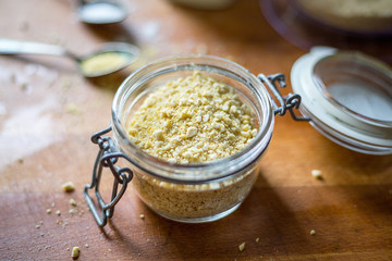 Cashew Nuts with Garlic and Salt in Bowl - Vegan Parmesan Cheese - obrazy, fototapety, plakaty
