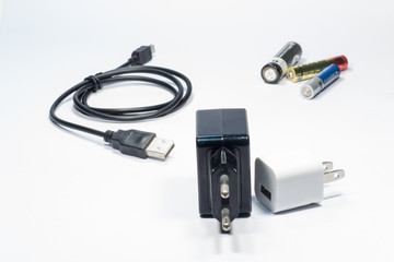Battery and charger adaptor.
Battery and charger devices on white background